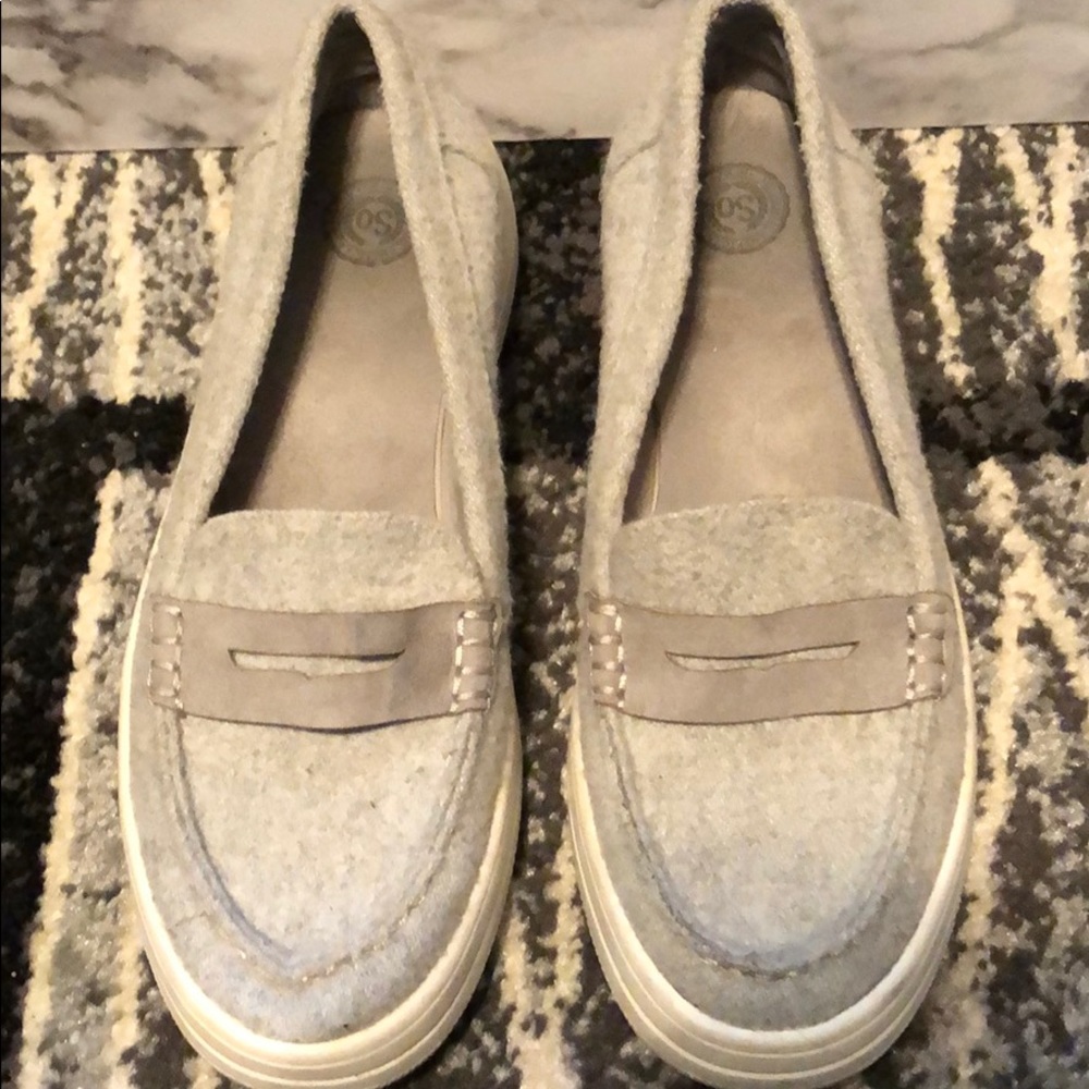 Slip on grey shoes.